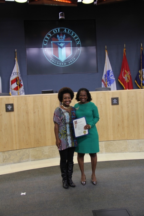 Akina-Adderley-and-Sheryl-Cole-With-The-ProclamationAkina-Adderley-Austin-City-Council-Proclamation-682x1024